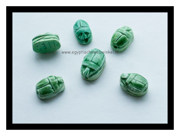 Small light green scarabs