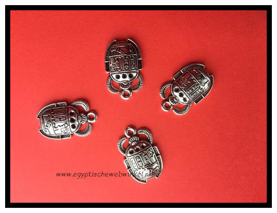 Small silver scarabs