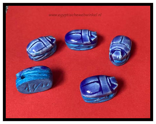 Small blue scarabs